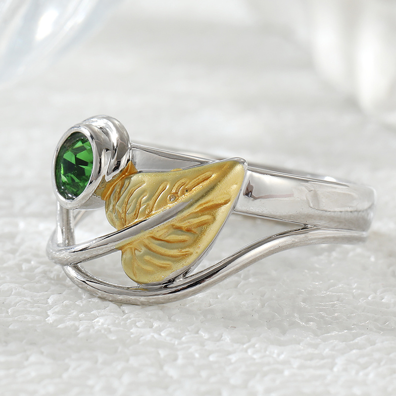 Bicolor Curved Leaf Ring with Green Synthetic Zirconia